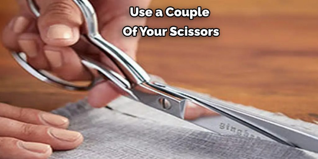 Use a Couple  Of Your Scissors