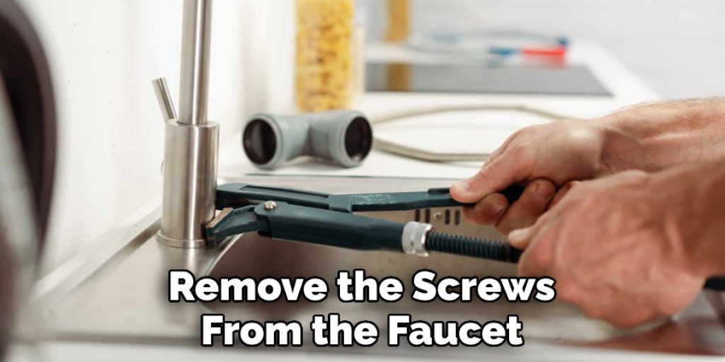 Remove the Screws From the Faucet