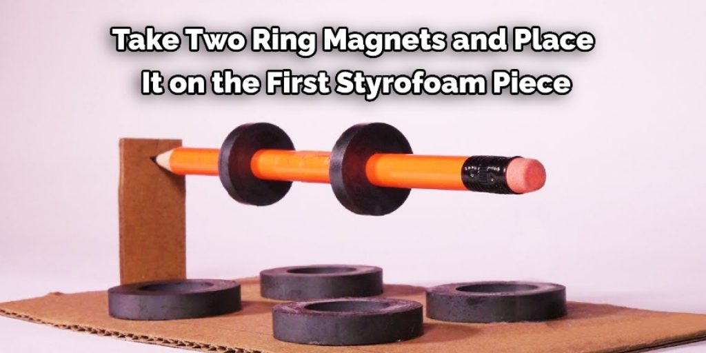 Take Two Ring Magnets and Place  It on the First Styrofoam Piece