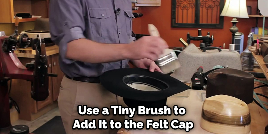 Use a Tiny Brush to Add It to the Felt Cap