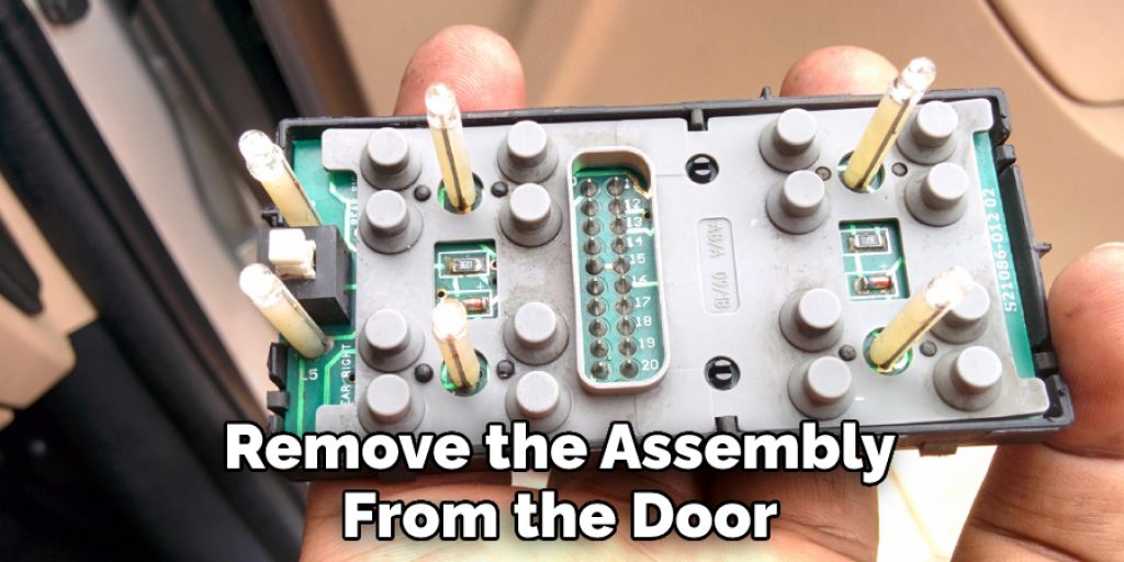Remove the Assembly From the Door