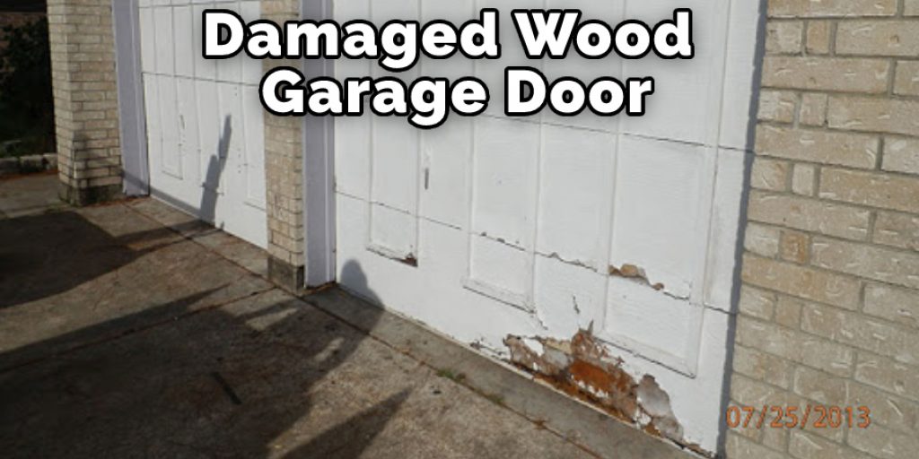 Damaged Wood Garage Door