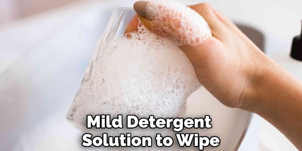 Mild Detergent Solution to Wipe