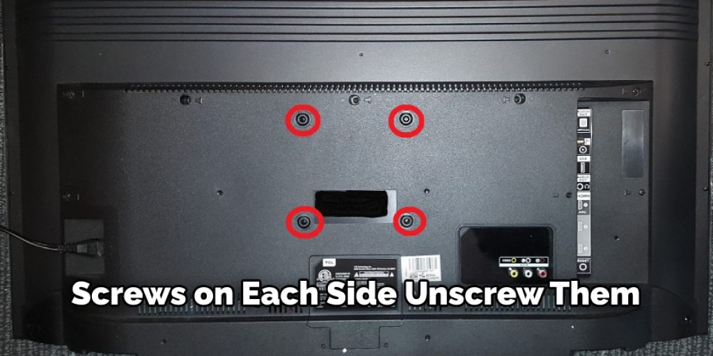 Screws on Each Side Unscrew Them