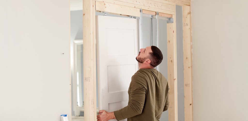 how to fix pocket door off track