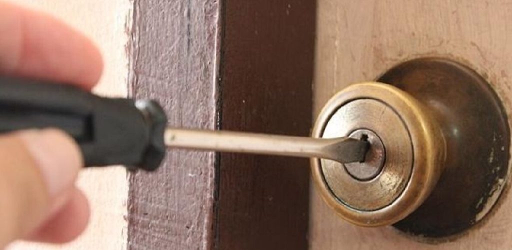 How to Unlock Bathroom Door With Hole on Side