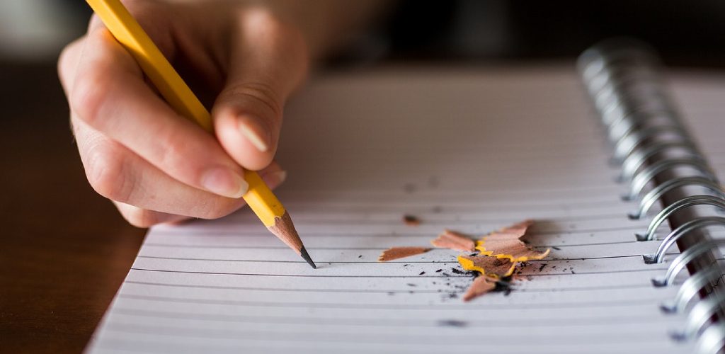 how to prevent pencil from smudging when writing