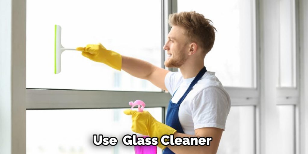 Use  Glass Cleaner