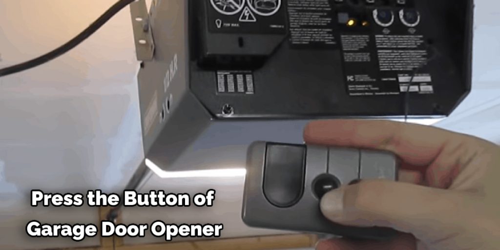 Press the Button of  Garage Door Opener