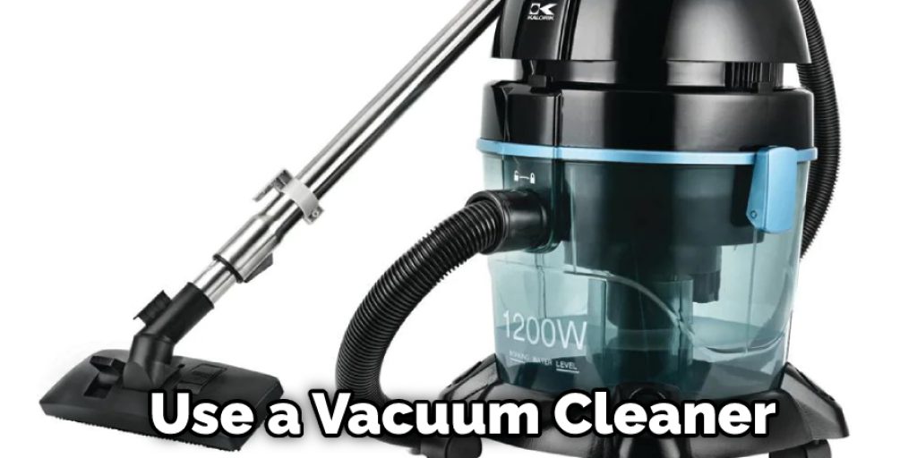 Use a Vacuum Cleaner