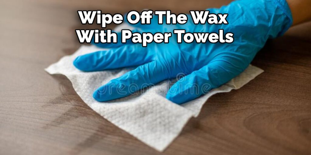 Wipe Off The Wax With Paper Towels
