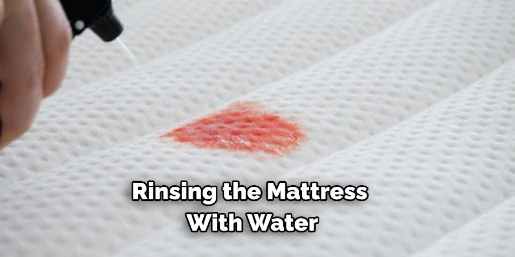 Rinsing the Mattress  With Water