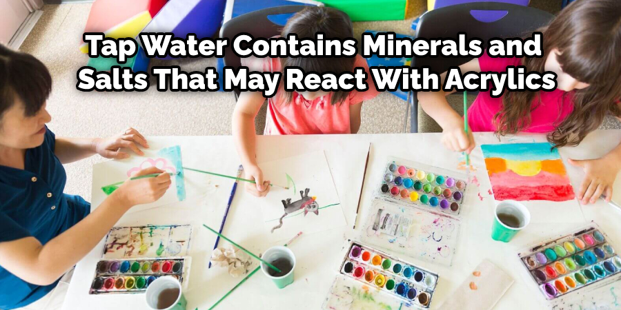 Using water straight out of the tap instead of distilled water. Water from the tap contains minerals and salts that may react with acrylics, preventing them from drying.
