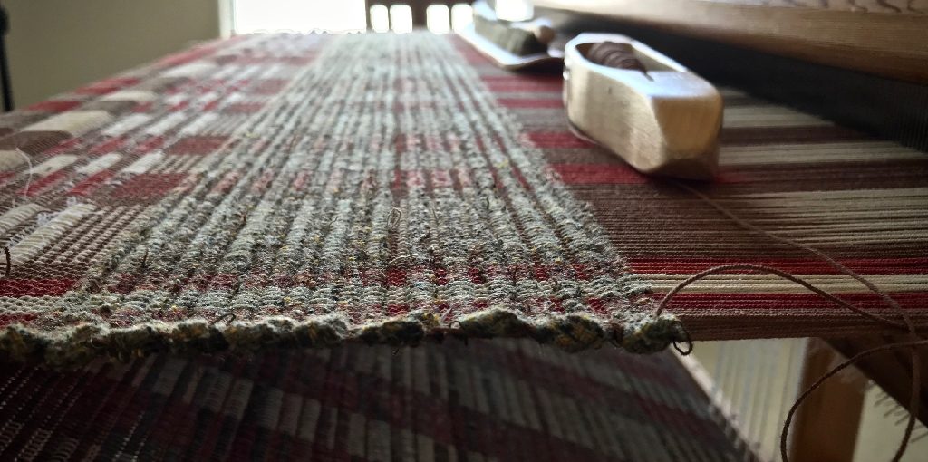 How to Weave a Rug Without a Loomful wool threads.