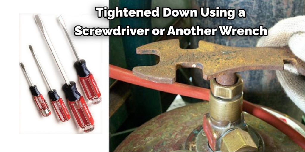  Tightened Down Using a  Screwdriver or Another Wrench