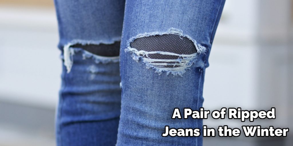 A Pair of Ripped  Jeans in the Winter