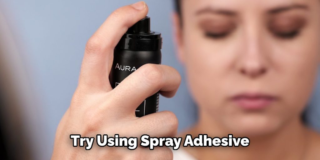 Try Using Spray Adhesive