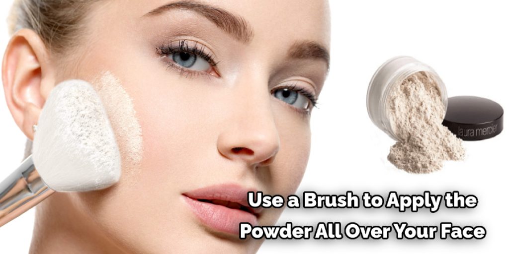  Use a Brush to Apply the  Powder All Over Your Face