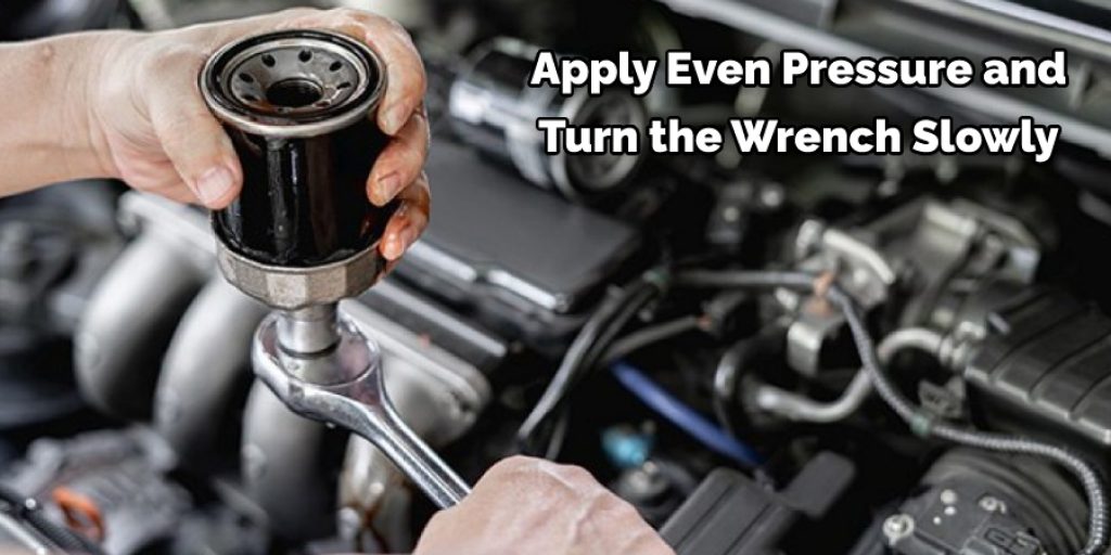 Apply Even Pressure and  Turn the Wrench Slowly 