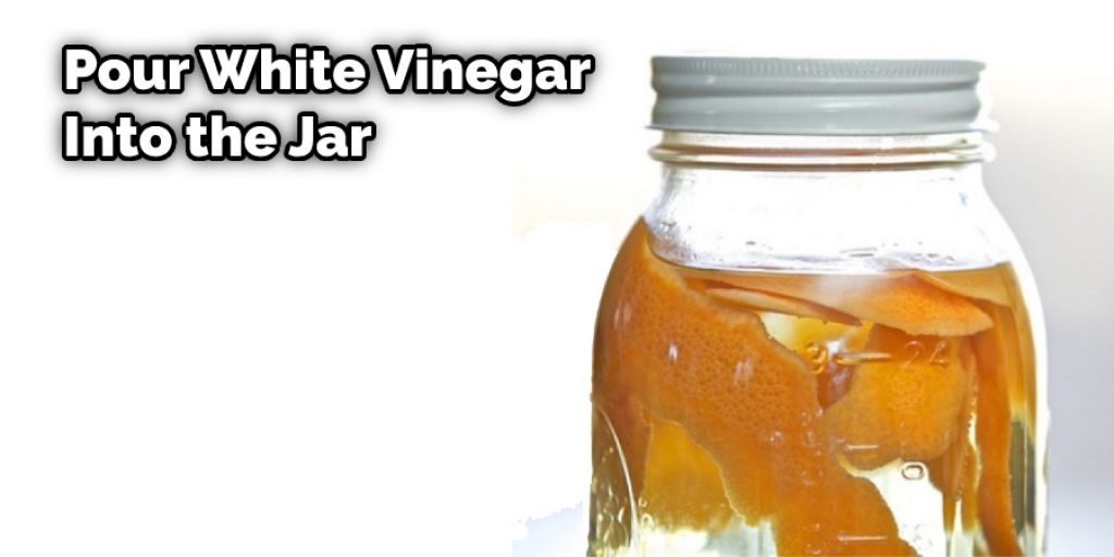 Pour White Vinegar Into the Jar