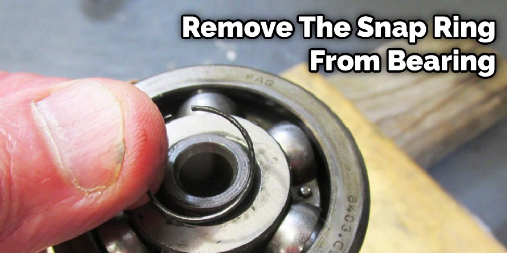 Remove The Snap Ring From Bearing