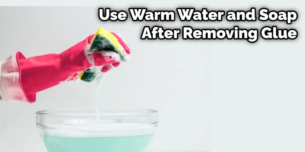 Use Warm Water and Soap After Removing Glue