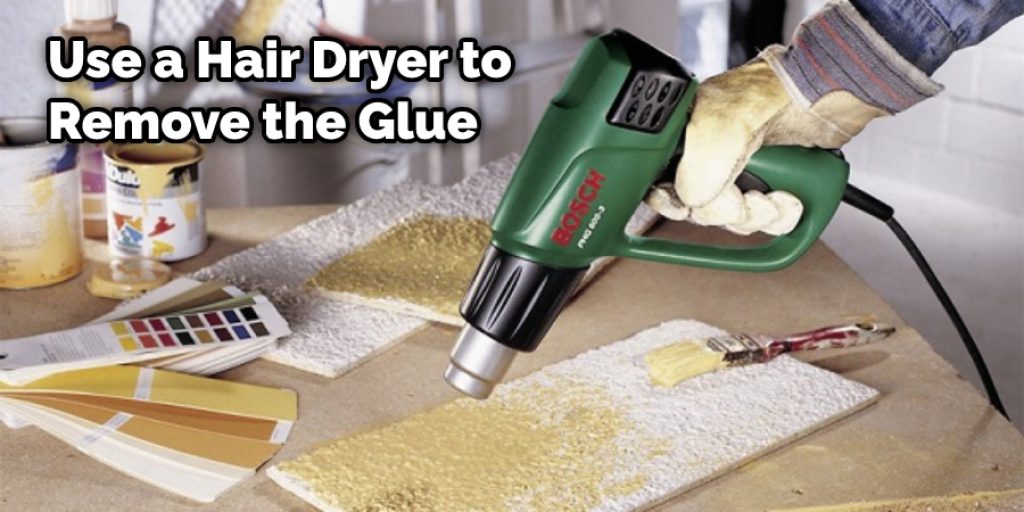 Use a Hair Dryer to Remove the Glue