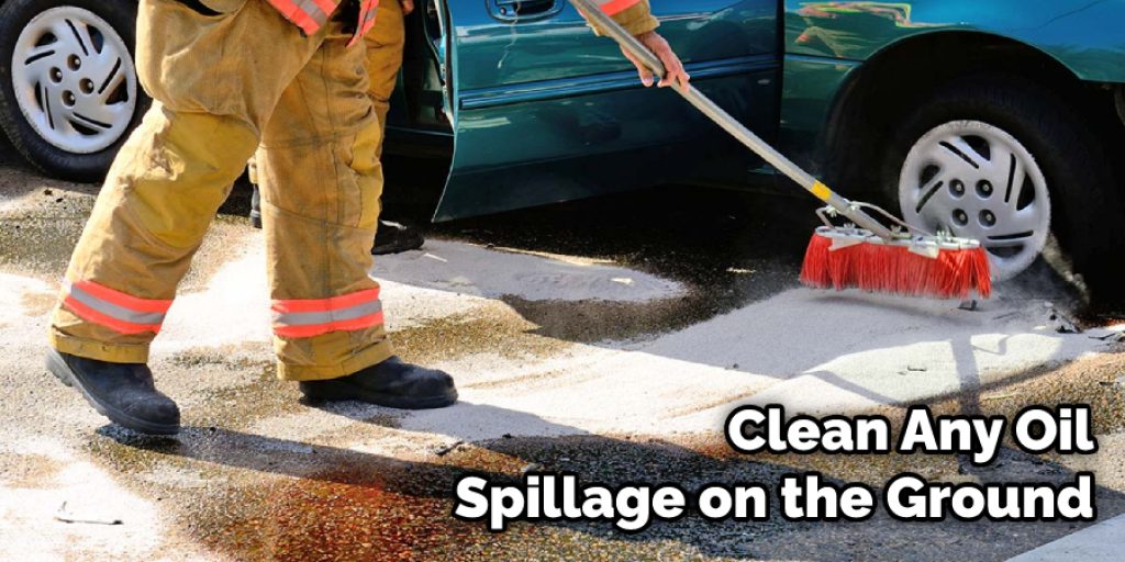 Clean Any Oil Spillage on the Ground
