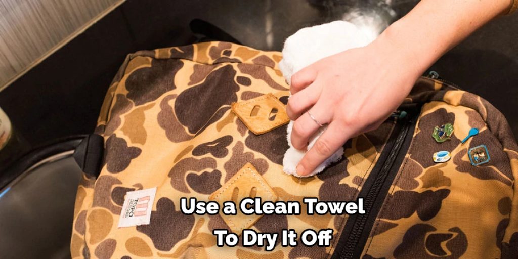 Use a Clean Towel To Dry It Off