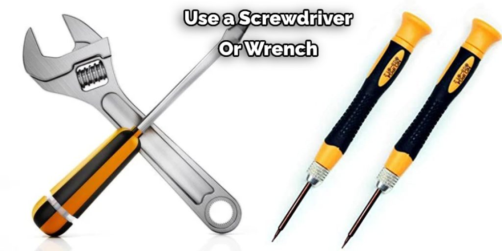 Use a Screwdriver Or Wrench