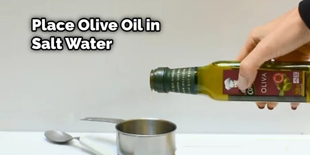 Place Olive Oil in Salt Water