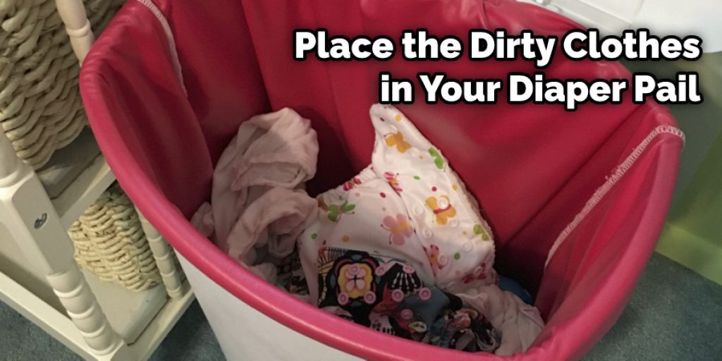 Place the Dirty Clothes in Your Diaper Pail