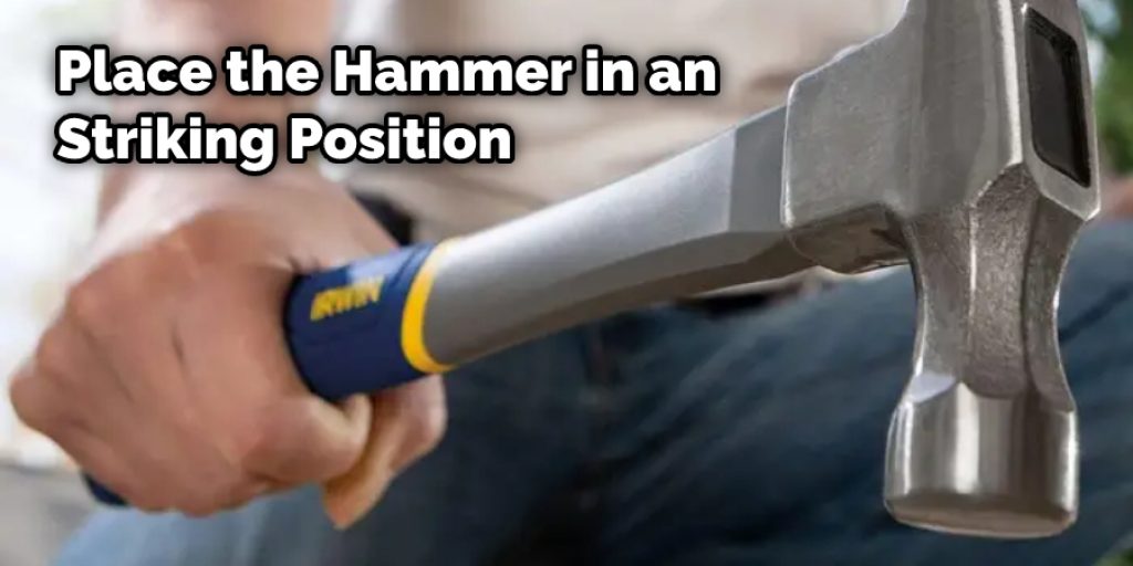 Place the Hammer in an Striking Position