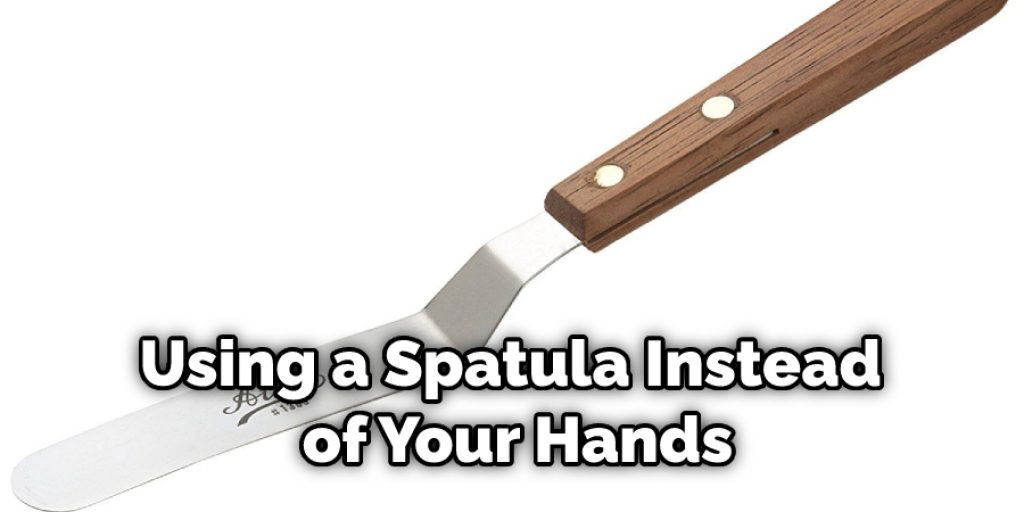 Using a Spatula Instead of Your Hands