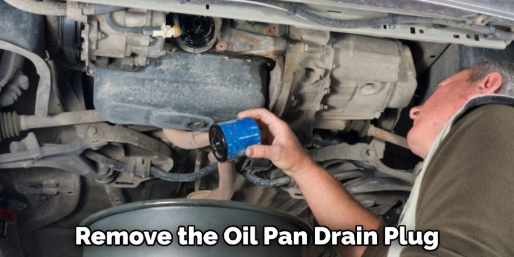  Remove the Oil Pan Drain Plug