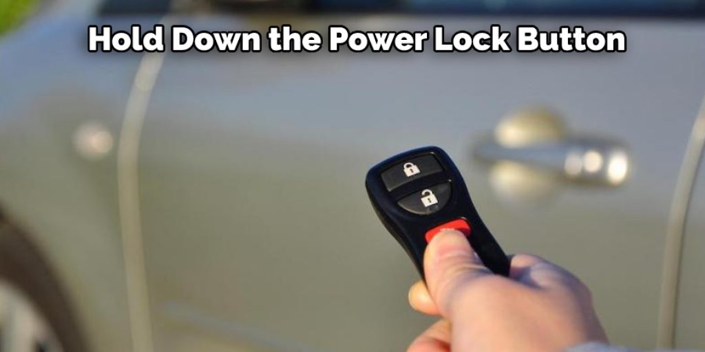 Hold Down the Power Lock Button 