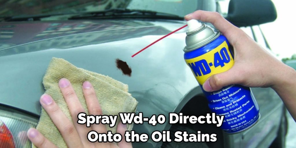Spray Wd-40 Directly  Onto the Oil Stains