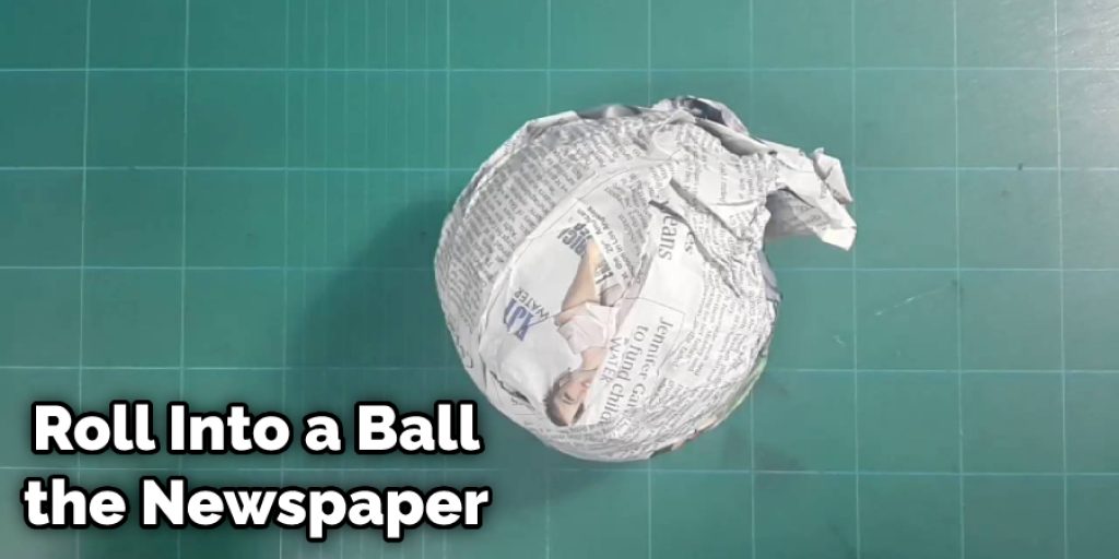 Roll Into a Ball the Newspaper 