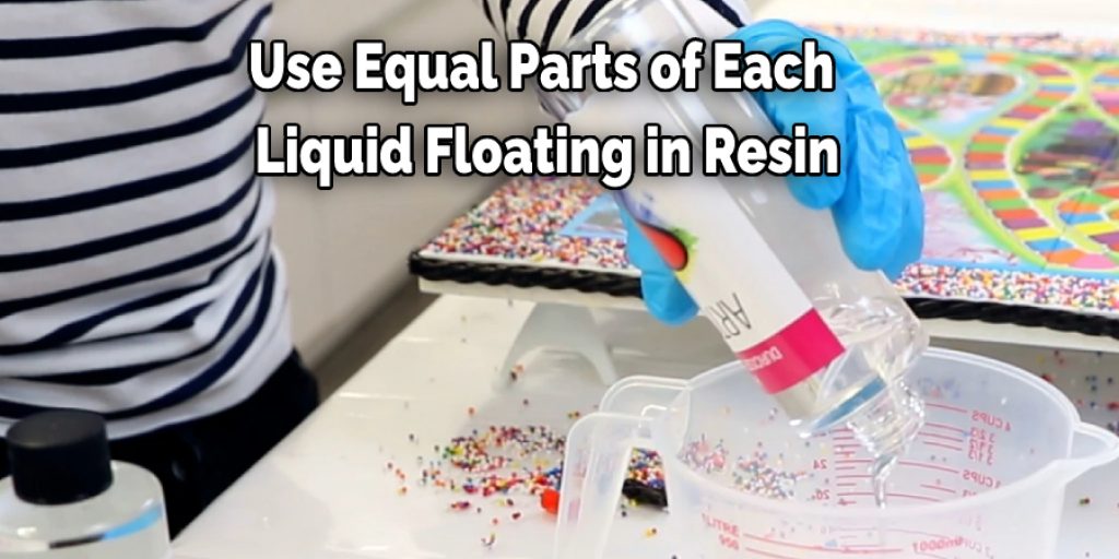 Use Equal Parts of Each  Liquid Floating in Resin