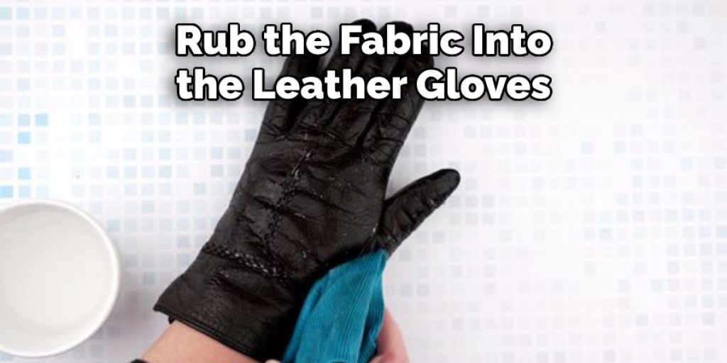 Rub the Fabric Into the Leather Gloves