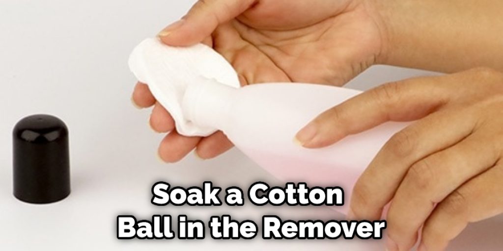 Soak a Cotton Ball in the Remover