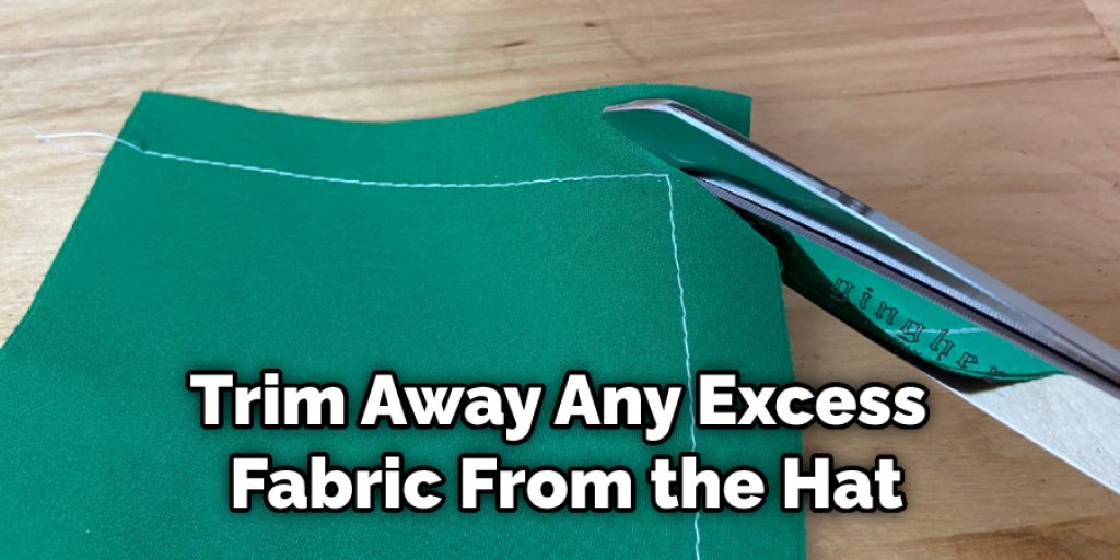 Trim Away Any Excess Fabric From the Hat