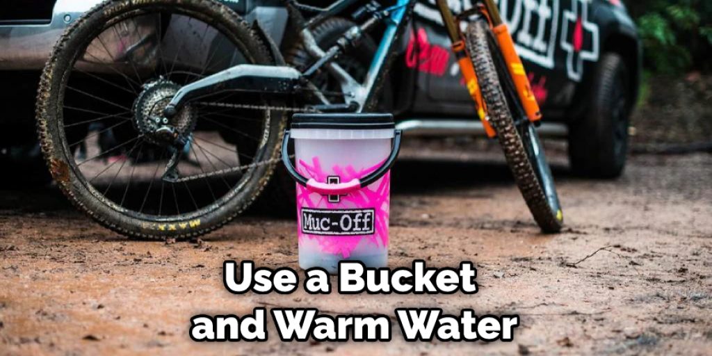 Use a Bucket and Warm Water