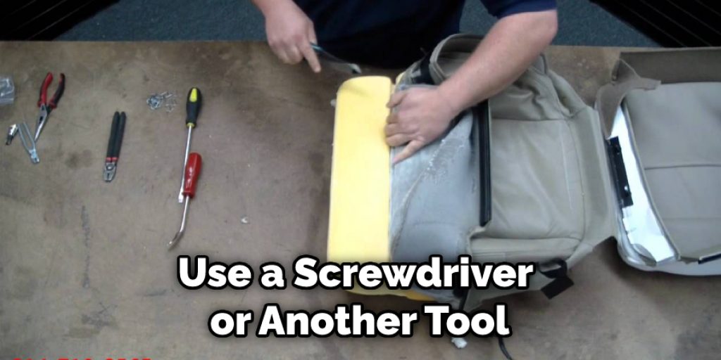 Use a Screwdriver or Another Tool