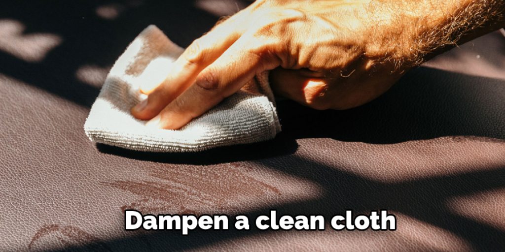 Dampen a clean cloth