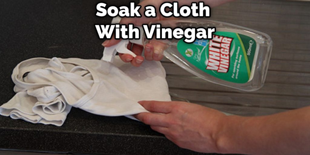 Soak a Cloth in Vinegar