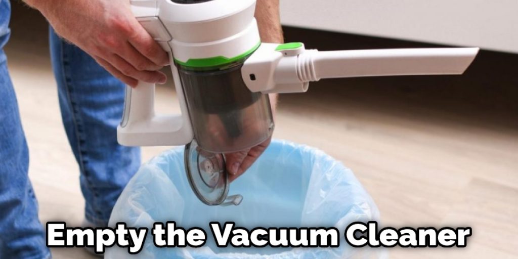 Empty the Vacuum Cleaner 