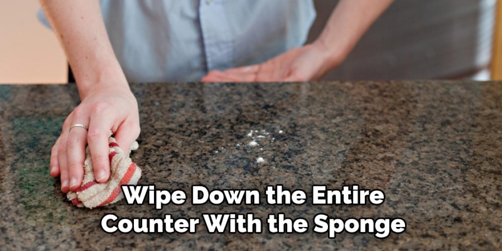 Wipe Down the Entire Counter With the Sponge