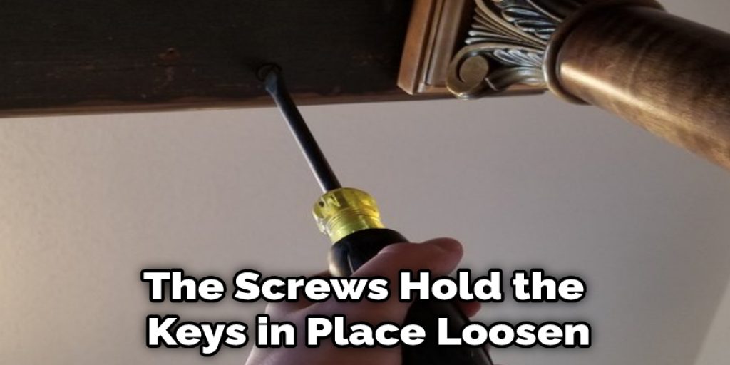 The Screws Hold the  Keys in Place Loosen