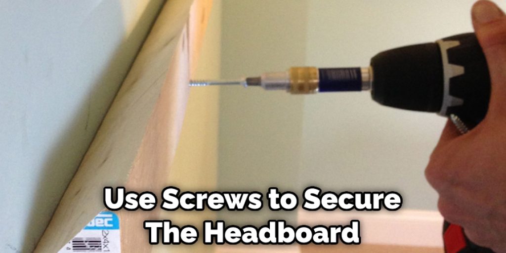 Use Screws to Secure The Headboard